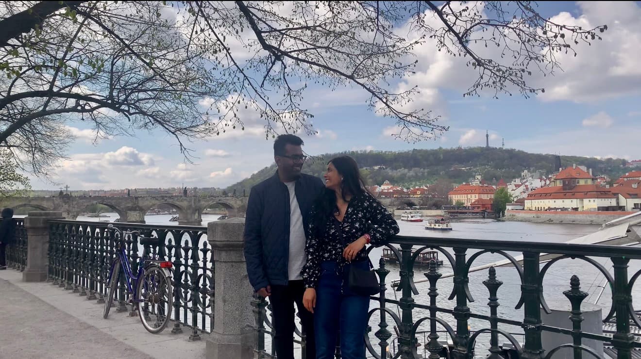 Namrata and Mayur by the Vltava River in Prague