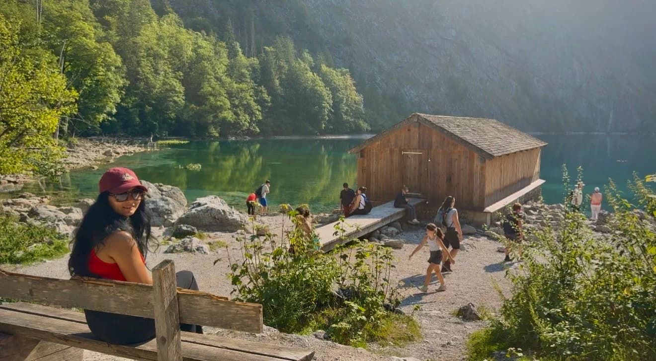 Wooden boathouse on Obersee with mountains behind