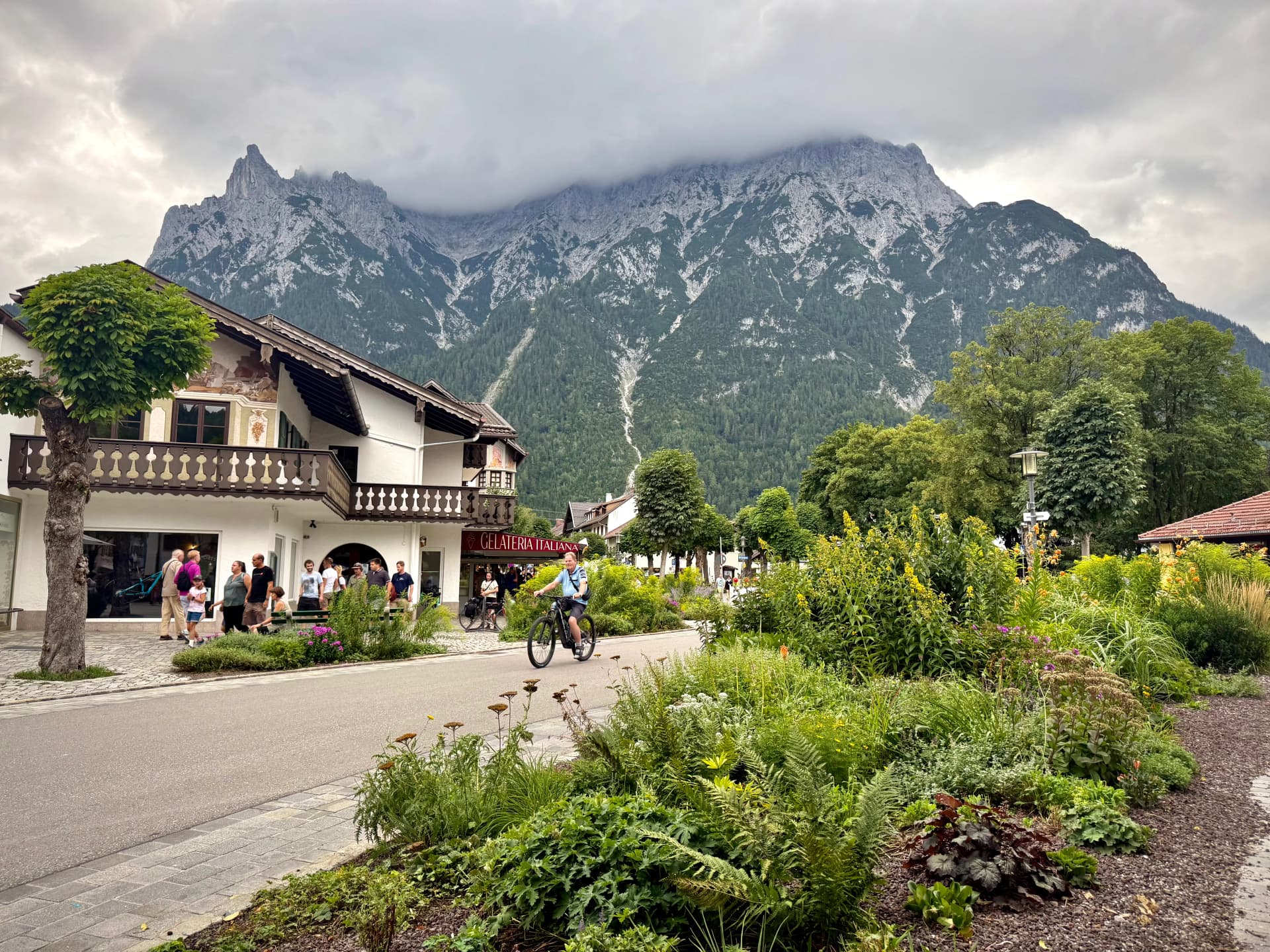 Wide Mittenwald street with mountains behind the town