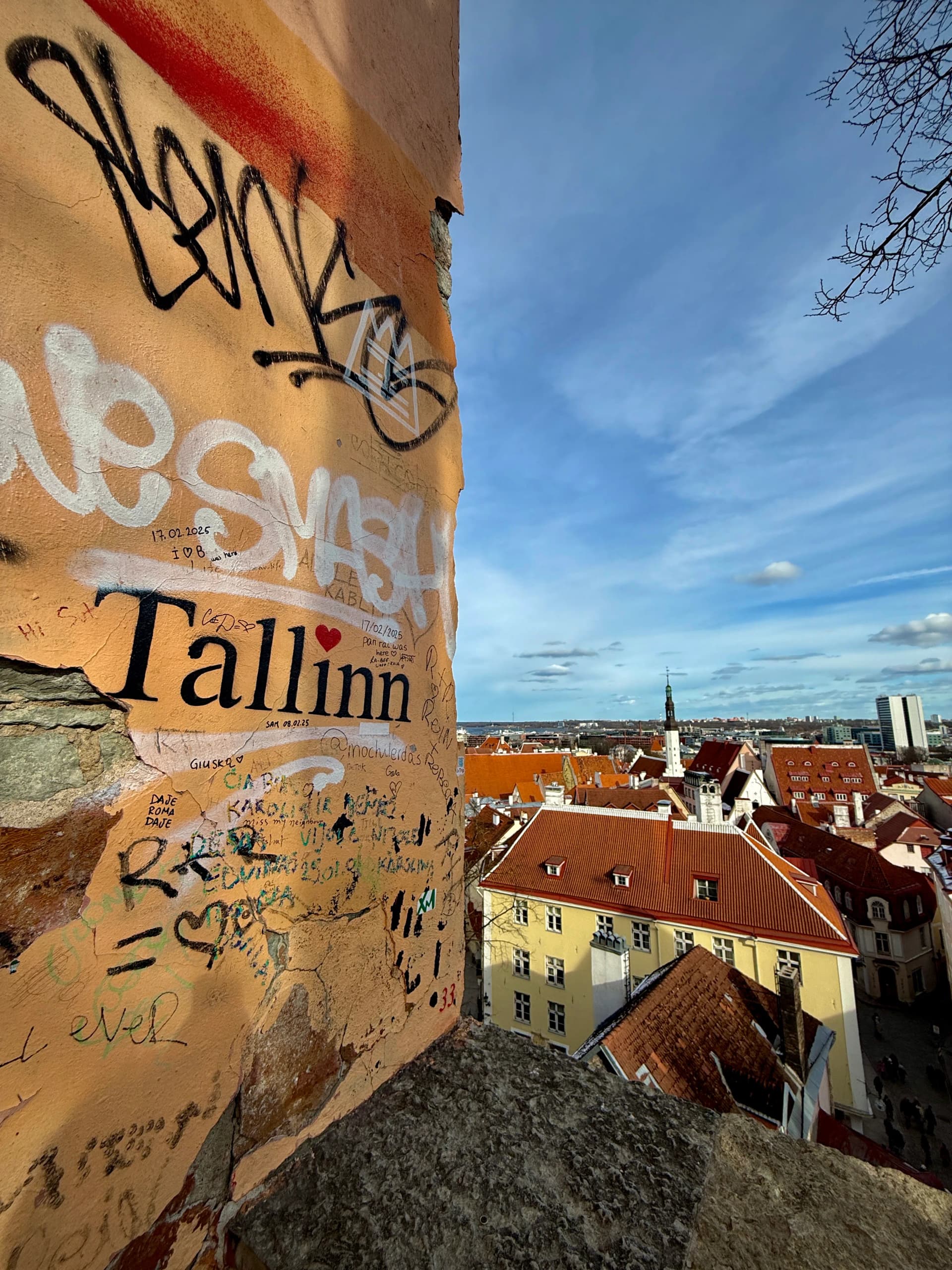 Panoramic view over Tallinn Old Town red rooftops from Kohtuotsa viewing platform