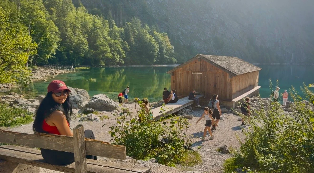 Wooden boathouse on Obersee with mountains behind