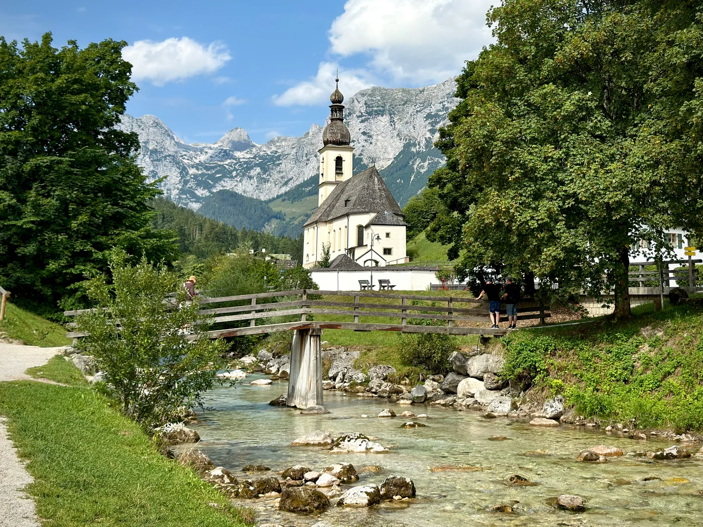 Ramsau Kirche with the Ramsauer Ache and mountains behind