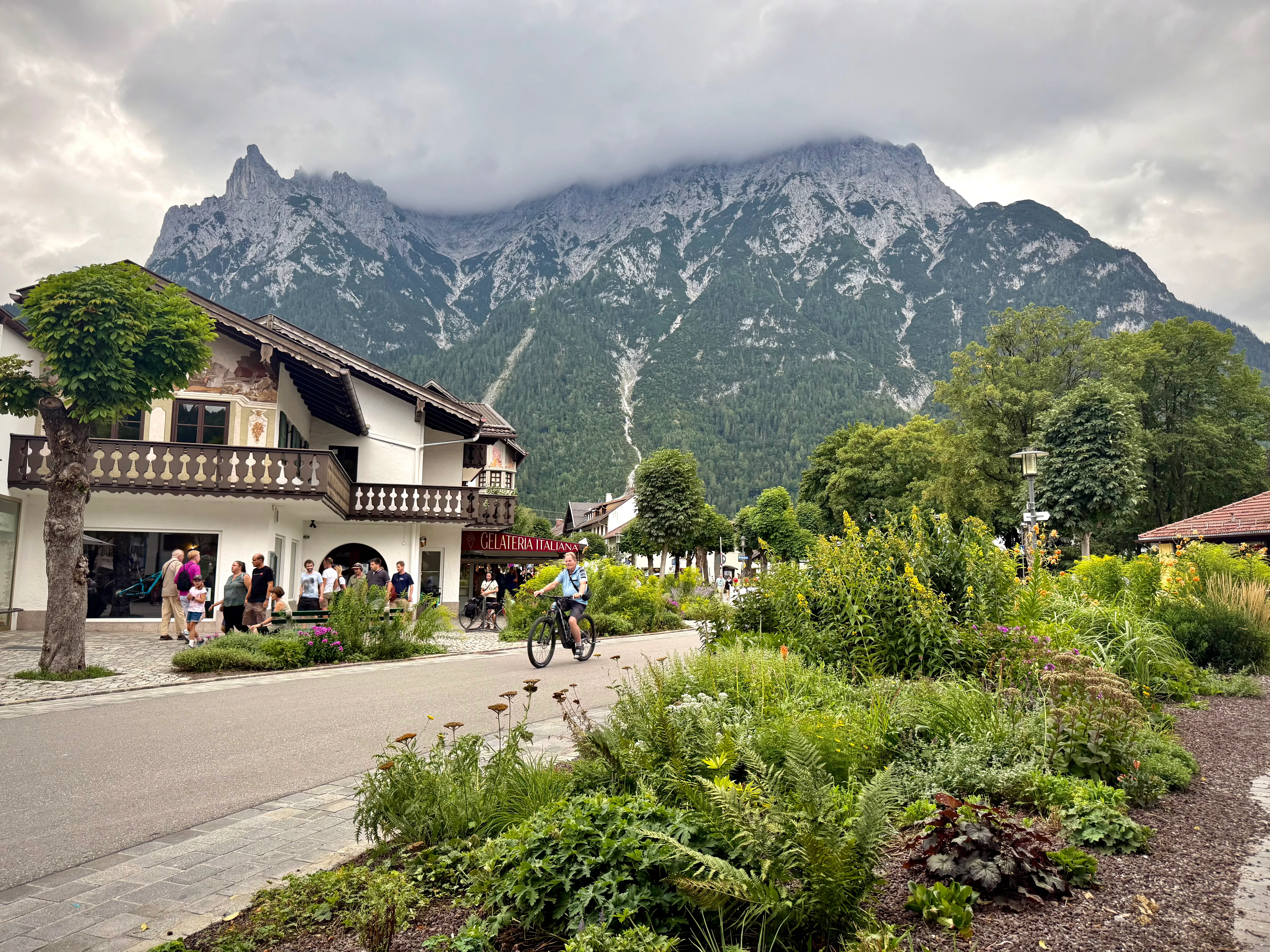 Wide Mittenwald street with mountains behind the town